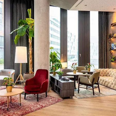 ホテル Radisson Blu At Porsche Design Tower 4*