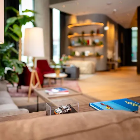 Radisson Blu At Porsche Design Tower Hotel 4*