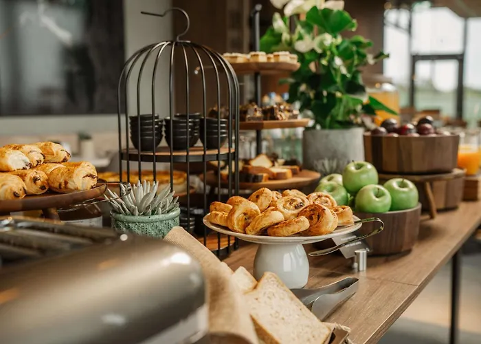 Отель Radisson Blu At Porsche Design Tower Штутгарт