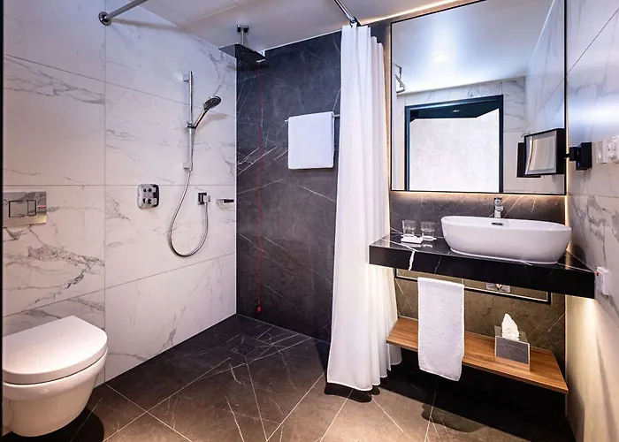 Radisson Blu At Porsche Design Tower Отель 4*